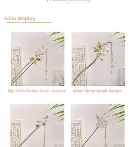 Détail de quatre épingles à cheveux chinoises rétro avec muguet et motifs de glands