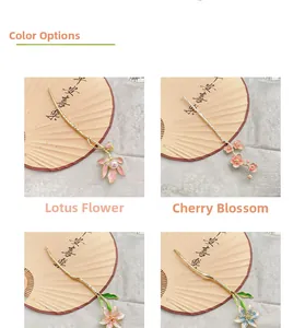Detail of metal lotus and peach blossom hairpins with pearls in traditional Chinese style