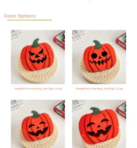 Détail de quatre pinces à cheveux citrouille d'Halloween de 6cm sur 5cm pour la coiffure