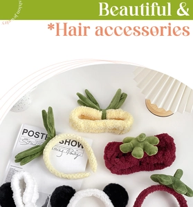 Close-up of soft plush panda and fruit headbands on a lifestyle background
