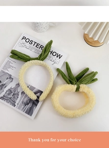 Detail of plush pineapple headband and scrunchie set for washing face and skincare