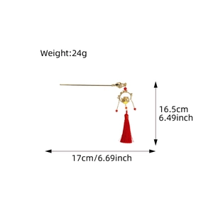 Ancient style hair pin with gold lantern, lotus flower, red tassel and beads on white background