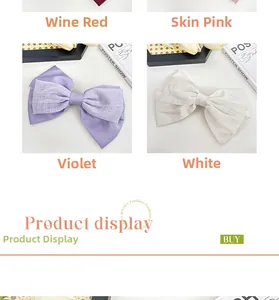 Détail de nœuds à cheveux en satin et mesh en bordeaux, rose poudré, lilas et blanc