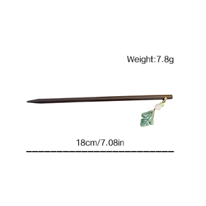 Minimalist dark brown wooden hair stick with green leaf pendant and 18cm total length