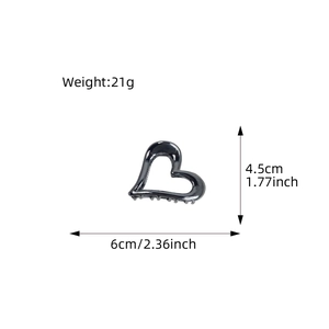 Hollow heart metal hair claw clip in silver finish with precise dimensions and weight