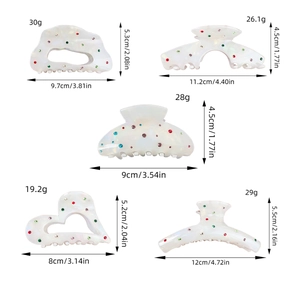 Pinces à cheveux rétro en acétate avec diamants colorés de différentes tailles et formes