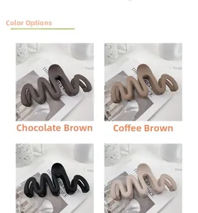 Multiple matte large wave hair claws in chocolate, brown, black, and beige colors