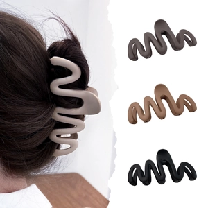 Large matte wavy shark hair claw clips for thick hair in earth tone colors