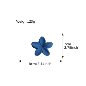 Blue plumeria flower hair claw clip with matte finish and size dimensions, weight 23g