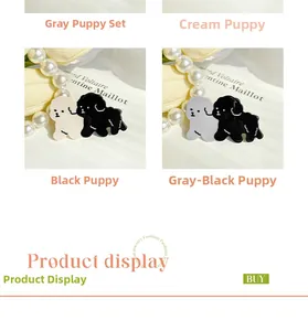 Detail von niedlichen Hunde-Haarspangen in Creme-Schwarz und Grau-Schwarz aus Acetat