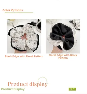 Detail of French floral scrunchies in chiffon showing black and white rose patterns