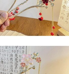 Detail of Chinese hair pin with red velvet tassels and pink glazed flower petals