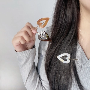 Three-piece retro acetate heart hairpins in amber, brown, and white with gold pins