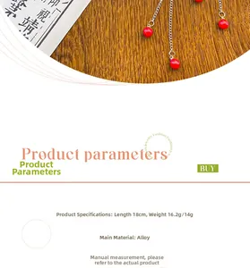 Detail view of alloy plum blossom hair stick with red tassel, 18cm length and 16.2g weight