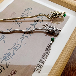 Traditional metal dragon hair pins in gold and silver with elegant tassels and beads