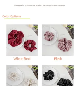 Close-up of four colored satin scrunchies with white dots in wine red, pink, white, and black