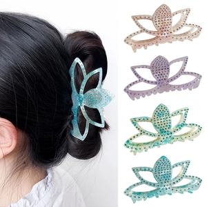 Pince à cheveux lotus élégante avec strass, disponible en bleu, violet et vert