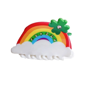 Rainbow cloud hair claw clip with colorful rhinestones and a green clover accent