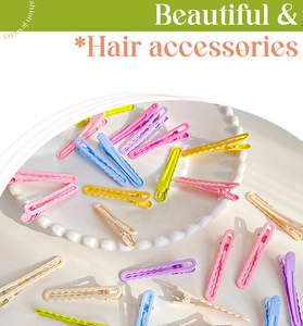 Macro shot of colorful wave-shaped metal hairpins in macaron tones for girls