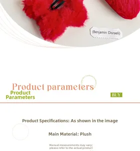 Macro shot of red plush hair clip with soft faux fur texture and metal duckbill clip detail