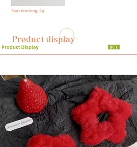 Detailed view of red plush star hair clip with measurements and black metal duckbill grip