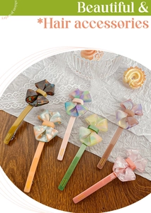 Détail de 6 barrettes nœuds en acétate faites main aux tons pastel et écaille de tortue