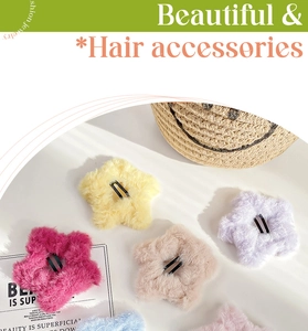 Close-up of star shaped plush hair clips in assorted candy colors with metal BB clips