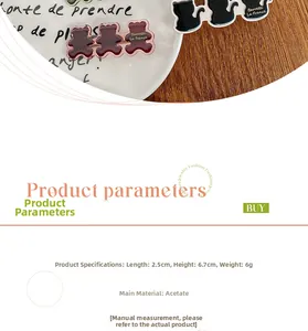 Detail showing acetate cat and bear hair clips with specific dimensions 2.5 by 6.7 cm