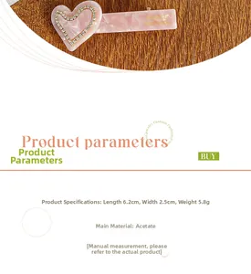 Pink heart-shaped acetate hair clip with rhinestones, sized 6.2cm by 2.5cm