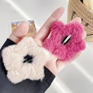 Plush star hair clips in cream and rose red colors for autumn and winter hair styling