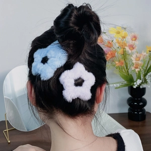 Plush flower hair clips in light blue and lavender colors for sweet autumn styling