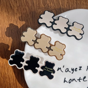 Three-piece set of cute bear-shaped hair clips in black, beige, and brown colors