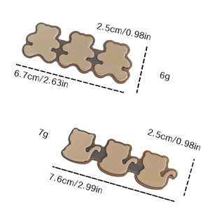 Cute animal-shaped hair barrettes featuring brown cat and bear designs in resin