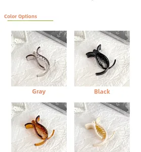 Mini shark hair clips set in grey, black, amber, and cream white for high ponytail styling