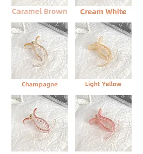 Selection of glossy acrylic hair clips in caramel, cream, and champagne colors