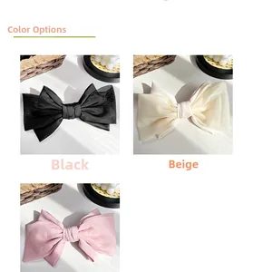 Three-color organza bow hair clips in black, beige and pink with layered mesh texture