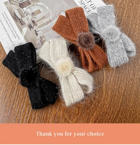 Detailed knit texture of autumn winter bow hair clips in black, white, and brown