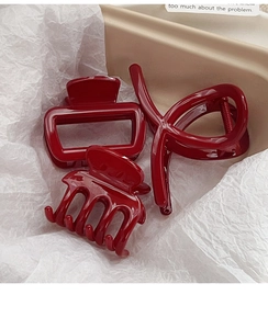 Three-piece set of deep red glossy hair claws including rectangular and cross styles