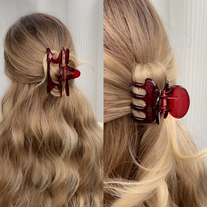 Elegant deep red large hair claw clips for women featuring star and curved designs