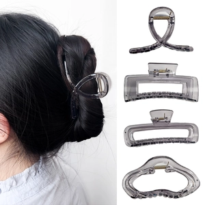 Translucent dark grey hair claw set with four geometric styles and strong metal spring