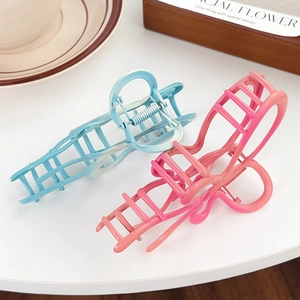Hollow grid hair claw clips in sky blue and coral pink matte finish for women
