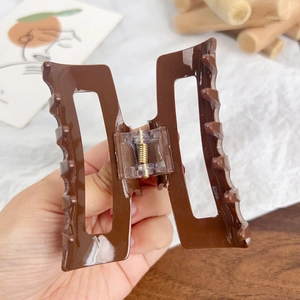 Classic dark brown square acrylic hair claw clip for women in a minimalist geometric style