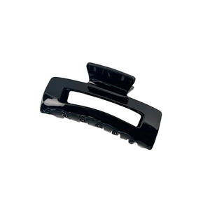 Minimalist square acrylic hair claw clip in glossy black resin with rectangular hollow design