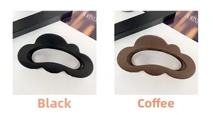 Detail of matte cloud-shaped hair claws in black and coffee colors for women