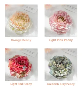 Detailed grid of silk peony flower hair clips with elegant silver butterfly accents