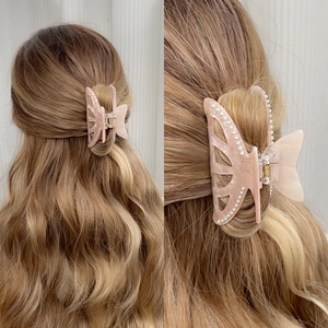 Elegant pearl butterfly hair claw clip with pink translucent acrylic and golden spring