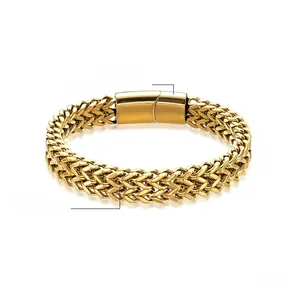 Detail view of 12mm wide high polished golden stainless steel braided chain bracelet