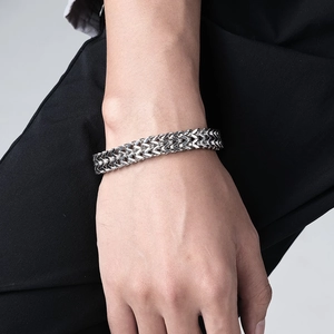 Men's double-row woven stainless steel chain bracelet with a secure magnetic clasp