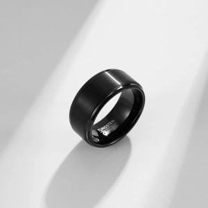 Macro shot of matte brushed black tungsten carbide ring with polished edges