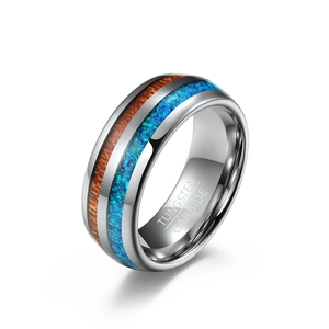 Polished tungsten carbide ring with inlaid dark wood grain and vibrant blue opal finish